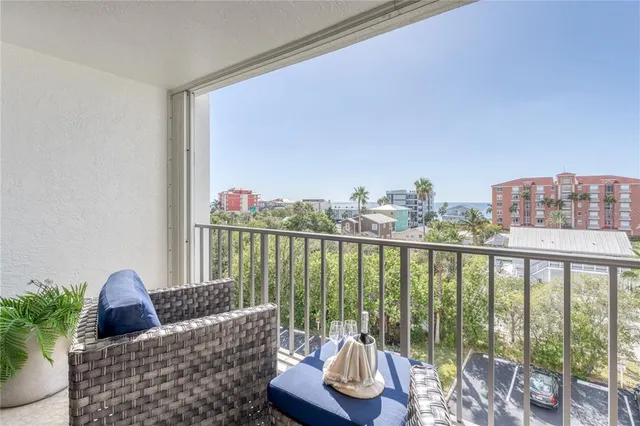 a view of a balcony with lake view and mountain view