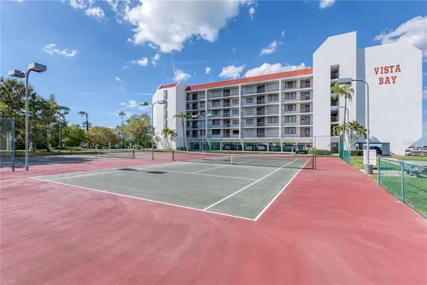 a view of a building with a basket ball court