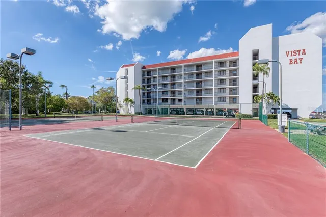 a view of a building with a basket ball court