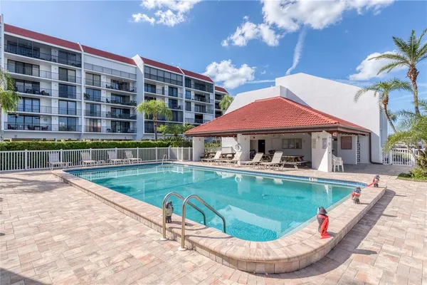 a view of a house with swimming pool