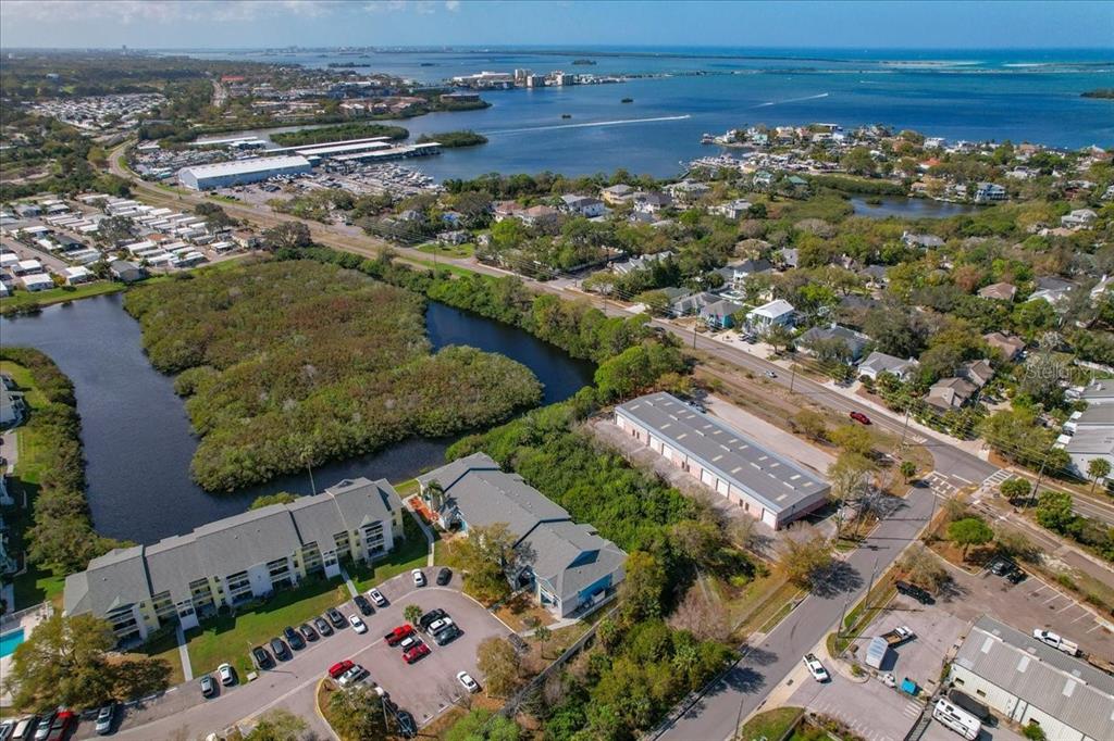 455 Alt 19, Unit 151 Palm Harbor, FL 34683 - Photo 2 of 52 an aerial view of a city