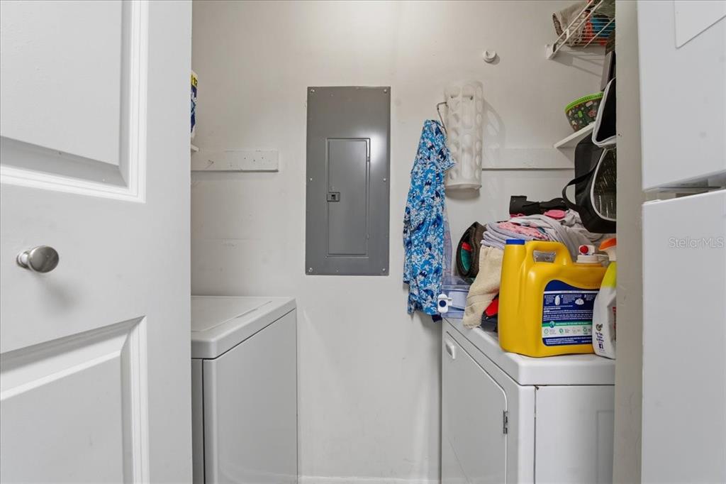 455 Alt 19, Unit 151 Palm Harbor, FL 34683 - Photo 22 of 52 a bathroom with a sink and mirror