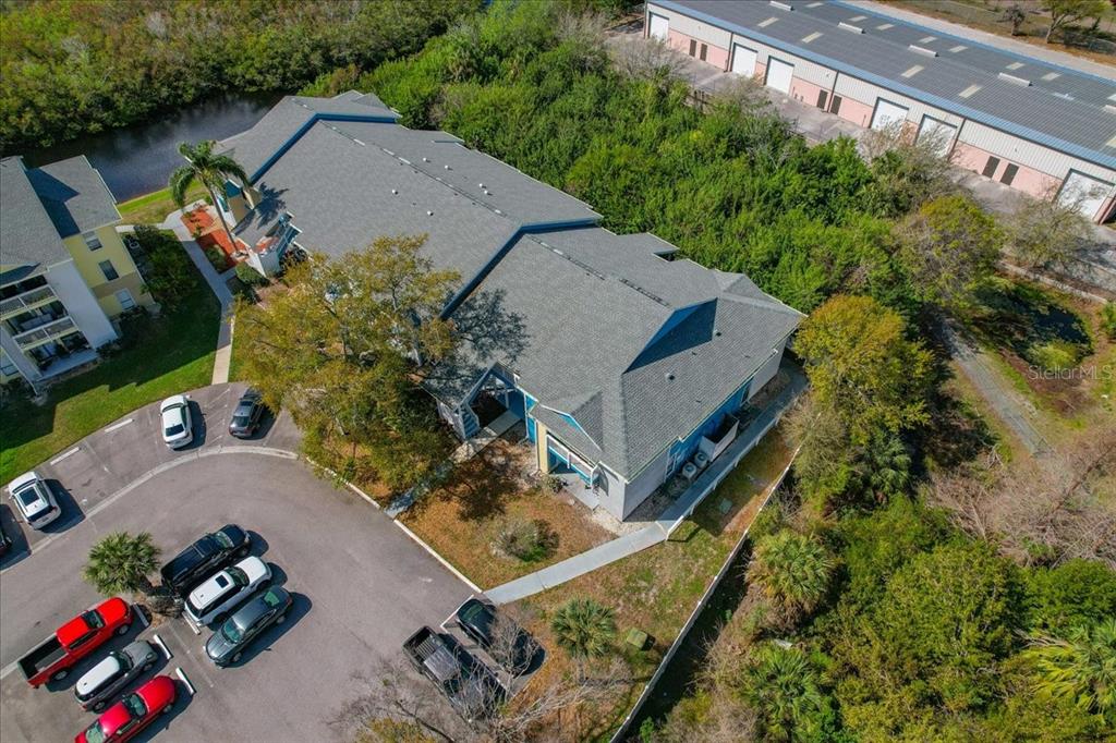 455 Alt 19, Unit 151 Palm Harbor, FL 34683 - Photo 43 of 52 an aerial view of a house with outdoor space