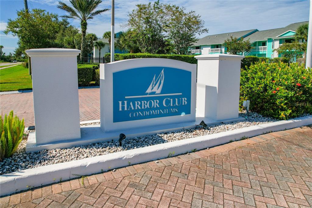 455 Alt 19, Unit 151 Palm Harbor, FL 34683 - Photo 48 of 52 a sign on the side of a building