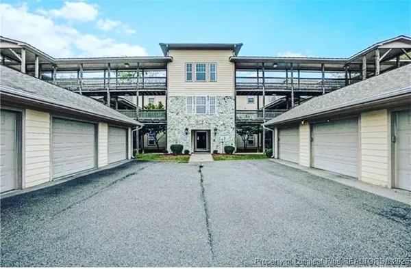 a view of a house with a street