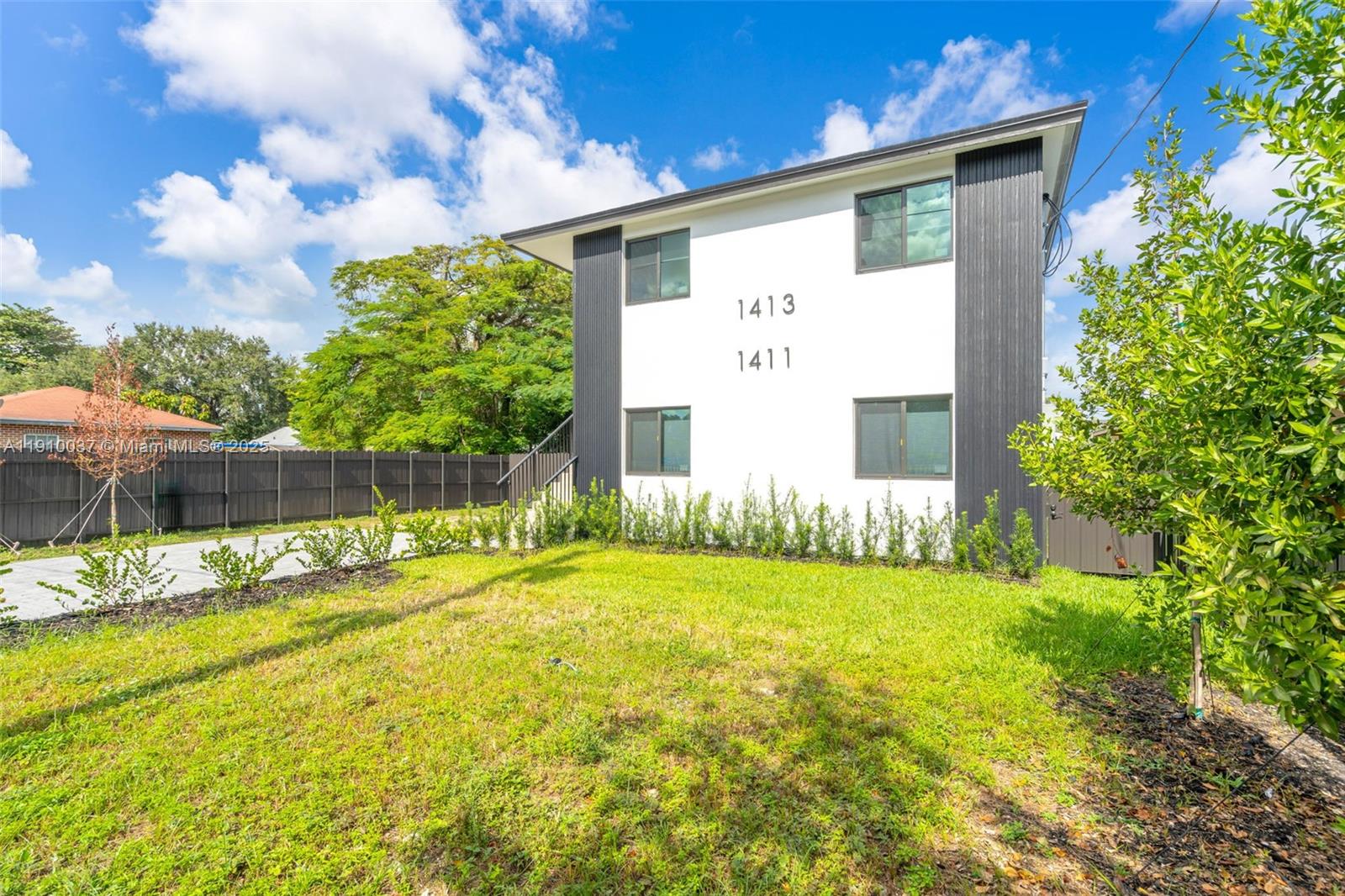1411 Northwest 40th Street Miami, FL 33142 - Photo 4 of 52 a view of a back yard of the house