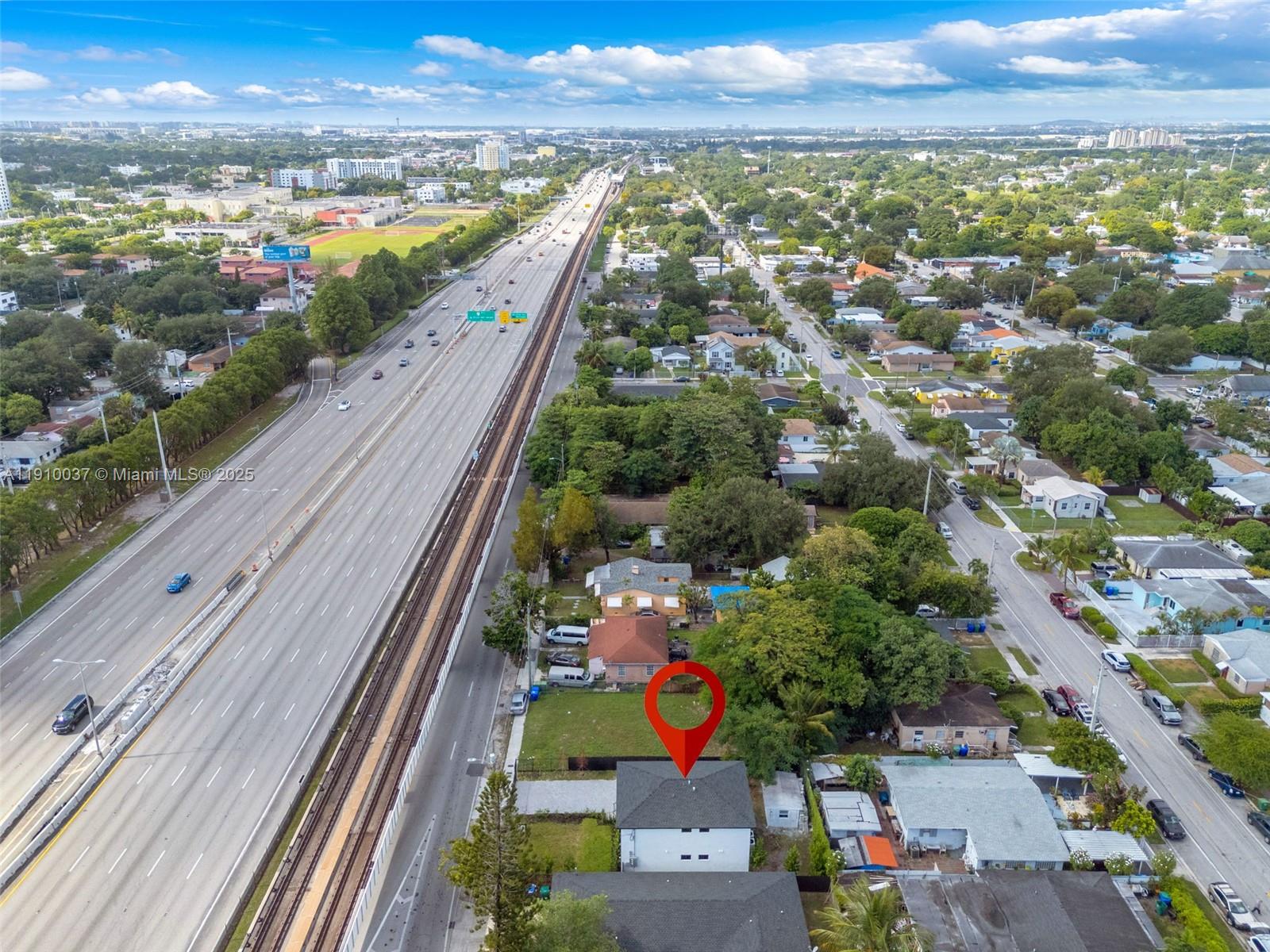 1411 Northwest 40th Street Miami, FL 33142 - Photo 45 of 52 a view of a city and mountains