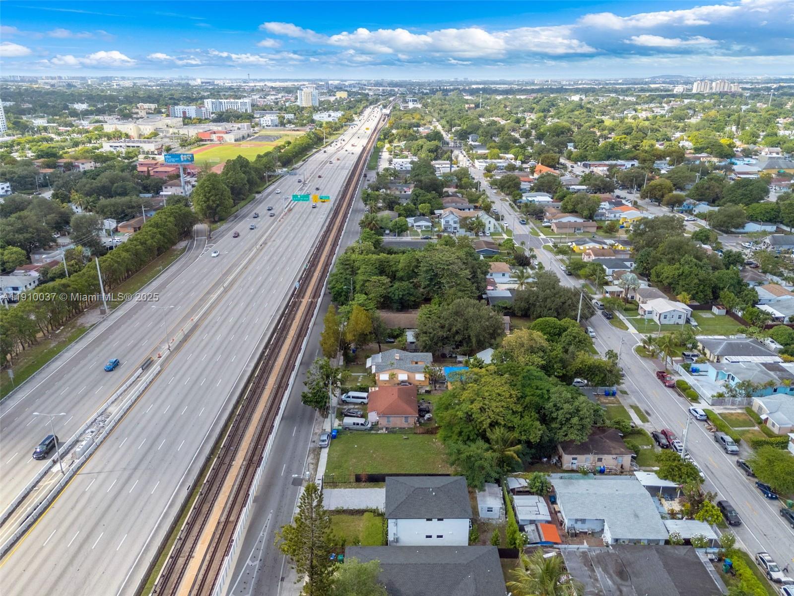 1411 Northwest 40th Street Miami, FL 33142 - Photo 46 of 52 an aerial view of residential houses with outdoor space