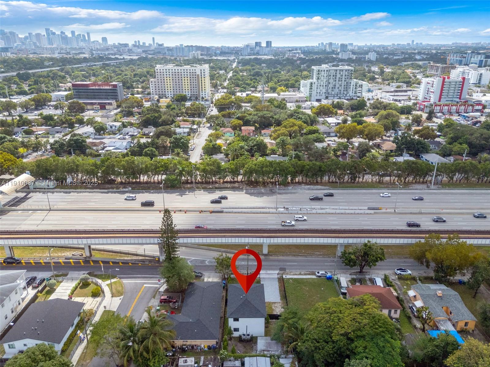 1411 Northwest 40th Street Miami, FL 33142 - Photo 47 of 52 an aerial view of a city