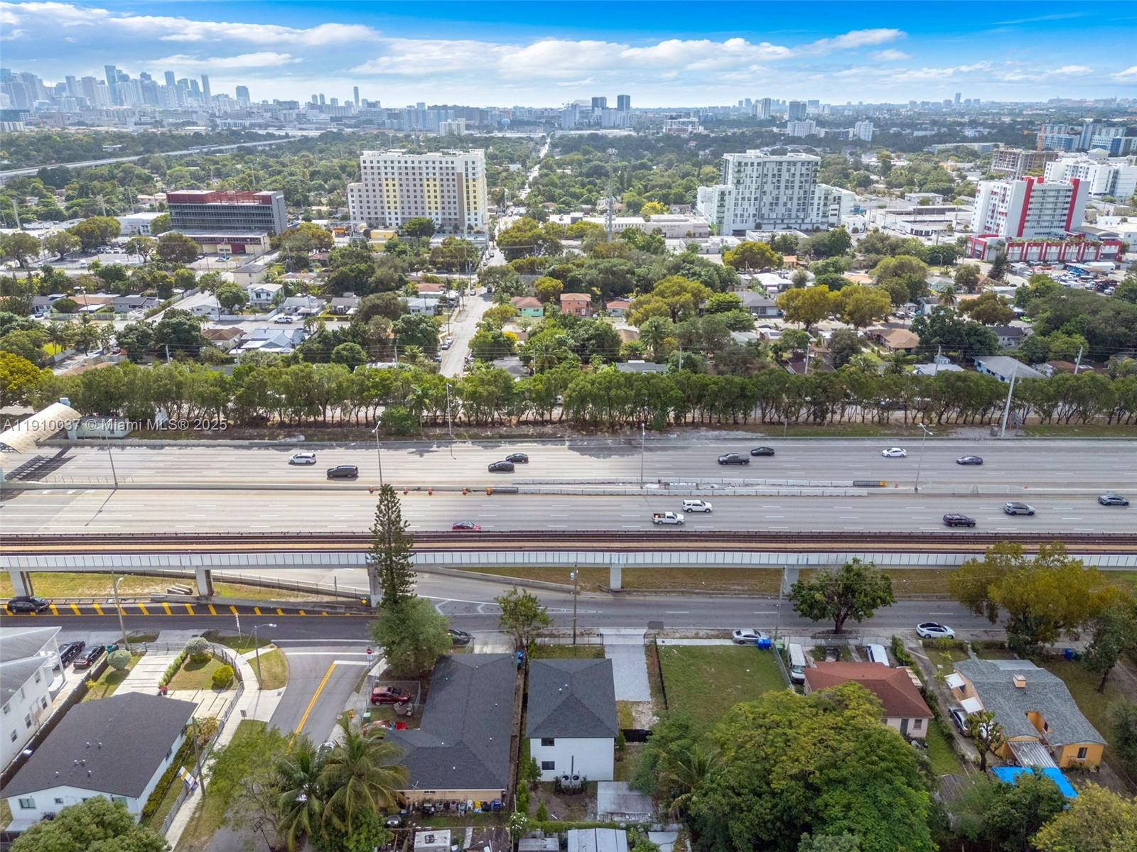 1411 Northwest 40th Street Miami, FL 33142 - Photo 48 of 52 an aerial view of a city