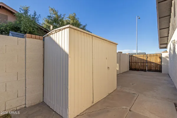 a view of backyard with tub