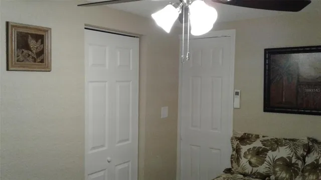 a bathroom with a mirror and a shower