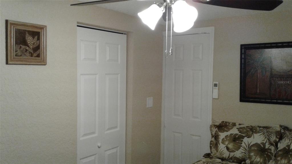 2512 Musselwhite Avenue, Unit 3 Orlando, FL 32804 - Photo 5 of 9 a bathroom with a mirror and a shower