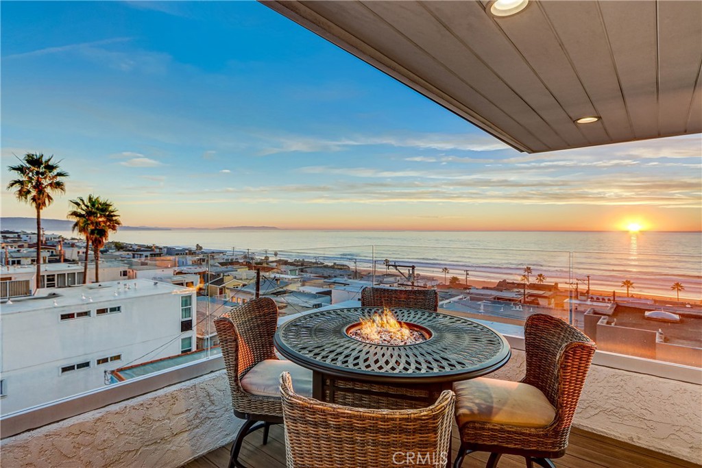 230 40th Street, Unit 3 Manhattan Beach, CA 90266 - Photo 26 of 38 a view of a swimming pool with a lounge chair