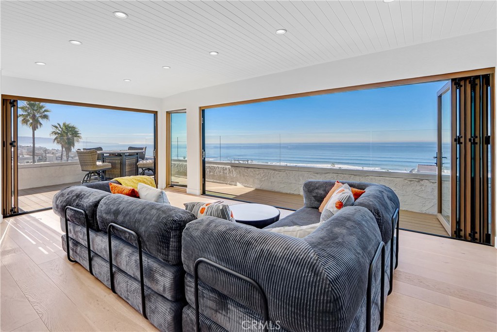 230 40th Street, Unit 3 Manhattan Beach, CA 90266 - Photo 6 of 38 a bedroom with two beds and a dresser next to a window