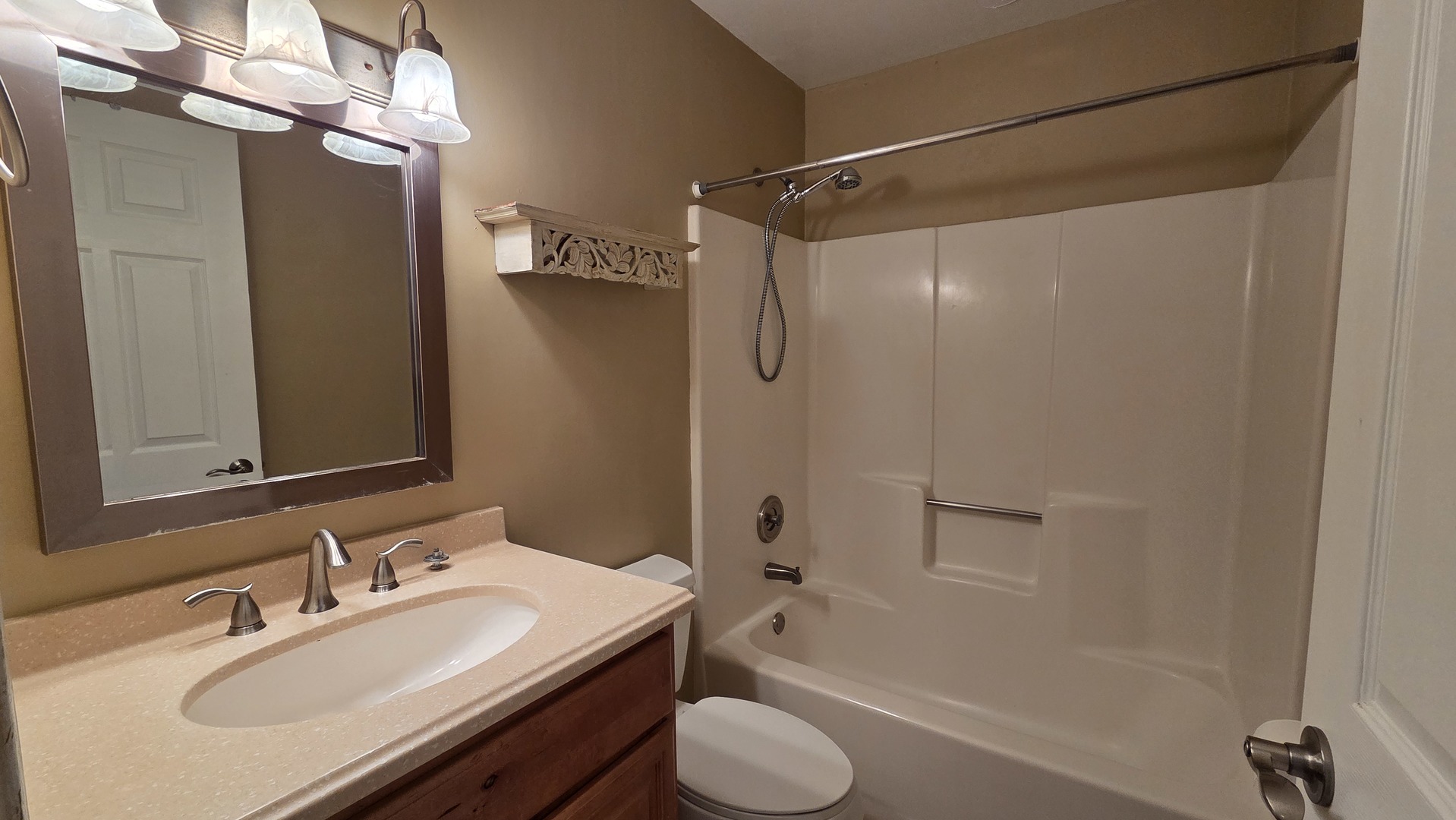 627 South Virginia Road, Unit 212 Crystal Lake, IL 60014 - Photo 11 of 15 a bathroom with a sink toilet tub and shower