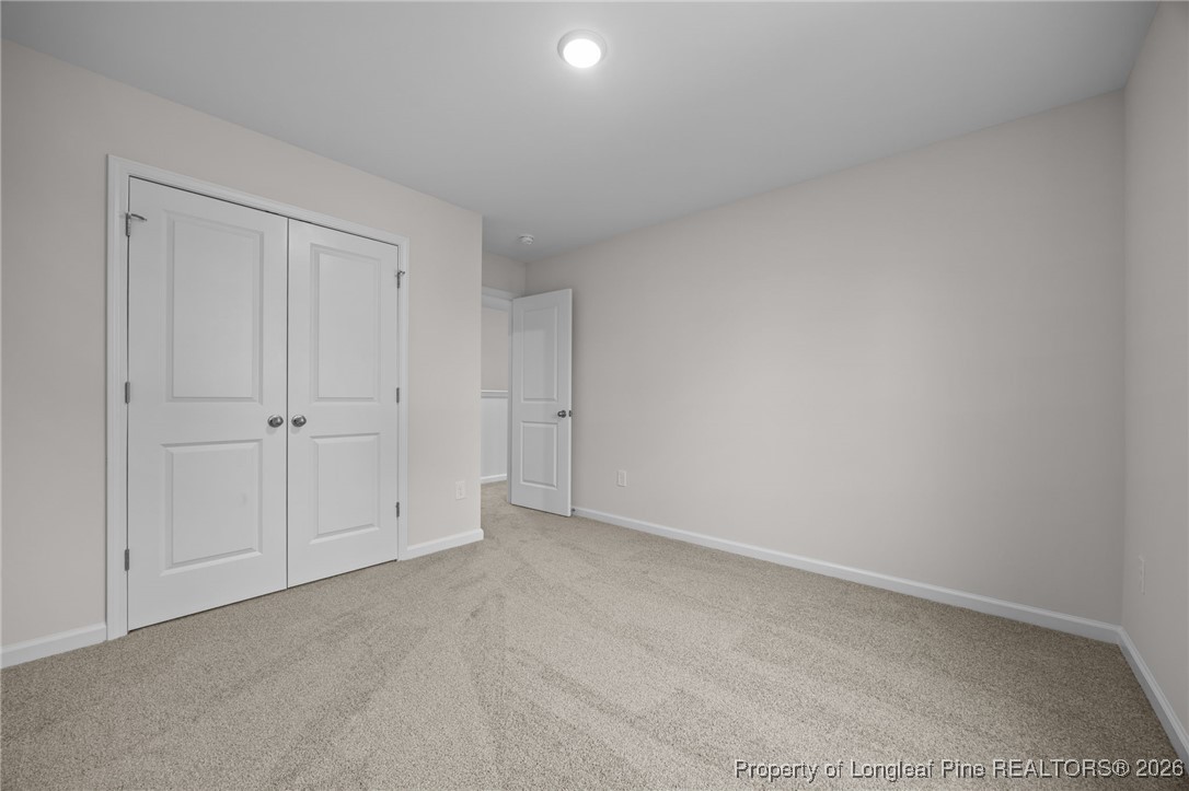 96 Regis Lane Coats, NC 27521 - Photo 16 of 36 a view of an empty room