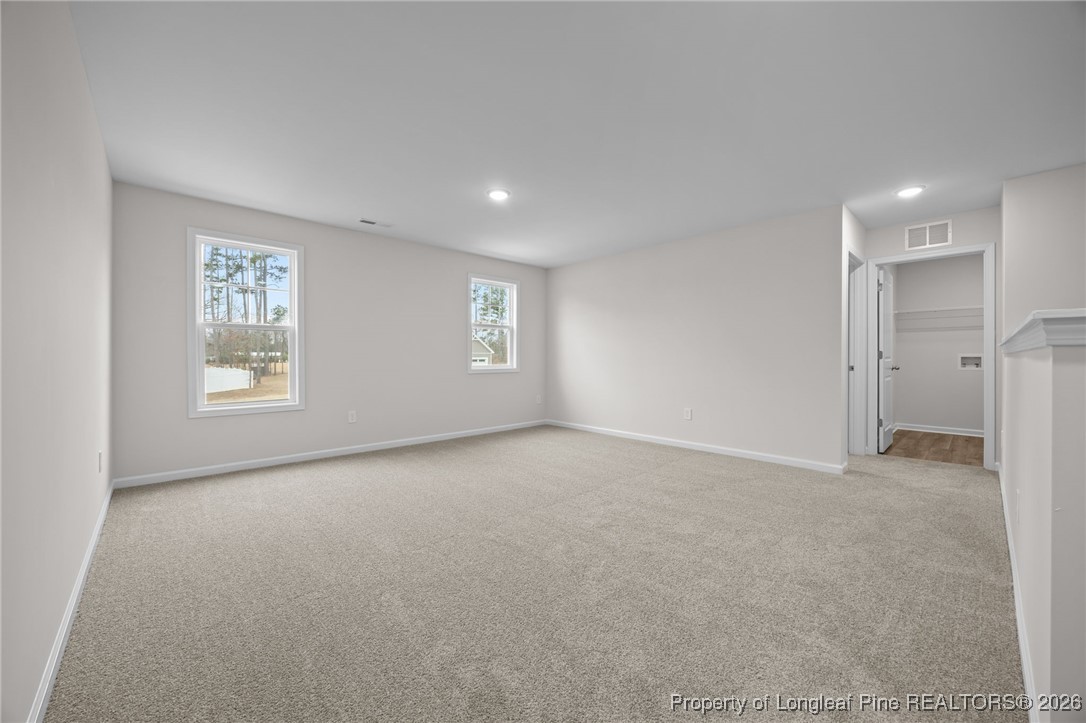 96 Regis Lane Coats, NC 27521 - Photo 19 of 36 a view of an empty room with a window