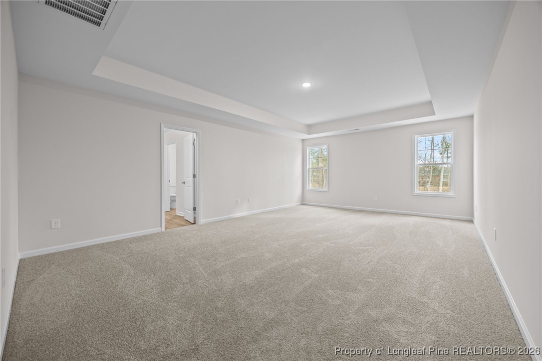 96 Regis Lane Coats, NC 27521 - Photo 24 of 36 a view of an empty room with a window