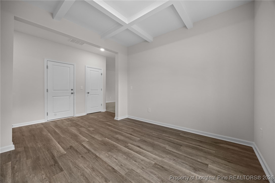 96 Regis Lane Coats, NC 27521 - Photo 3 of 36 a view of empty room with wooden floor