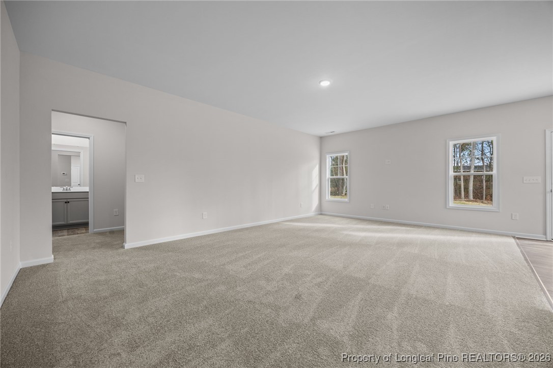 96 Regis Lane Coats, NC 27521 - Photo 31 of 36 a view of an empty room with a window