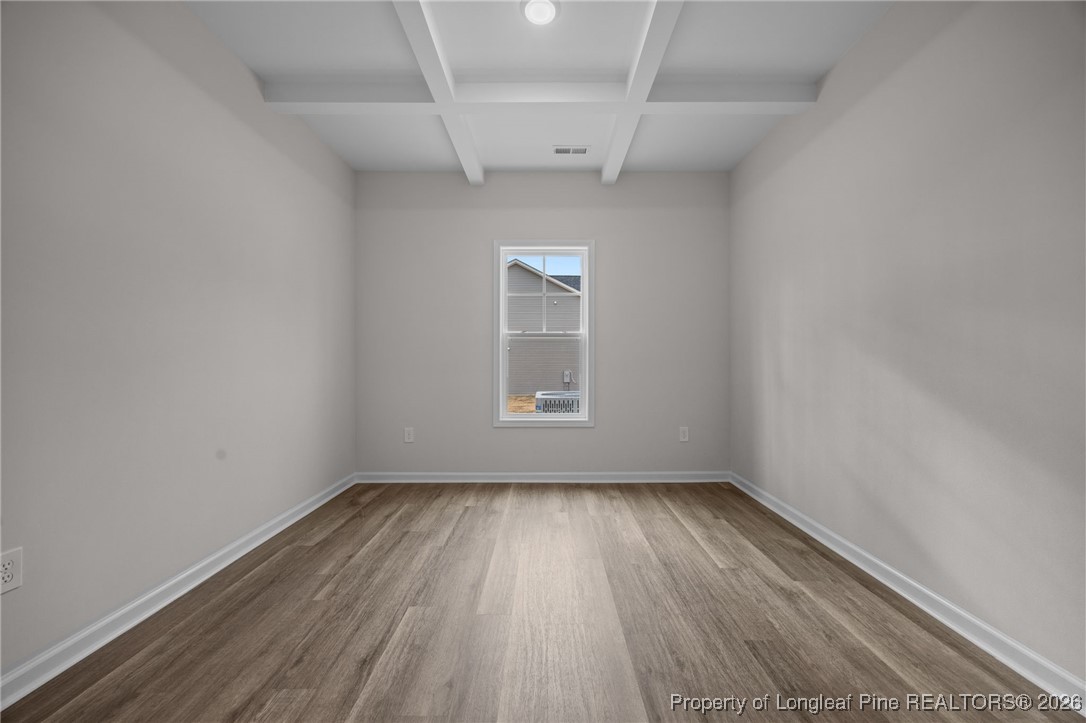 96 Regis Lane Coats, NC 27521 - Photo 4 of 36 a view of room with window and hardwood floor