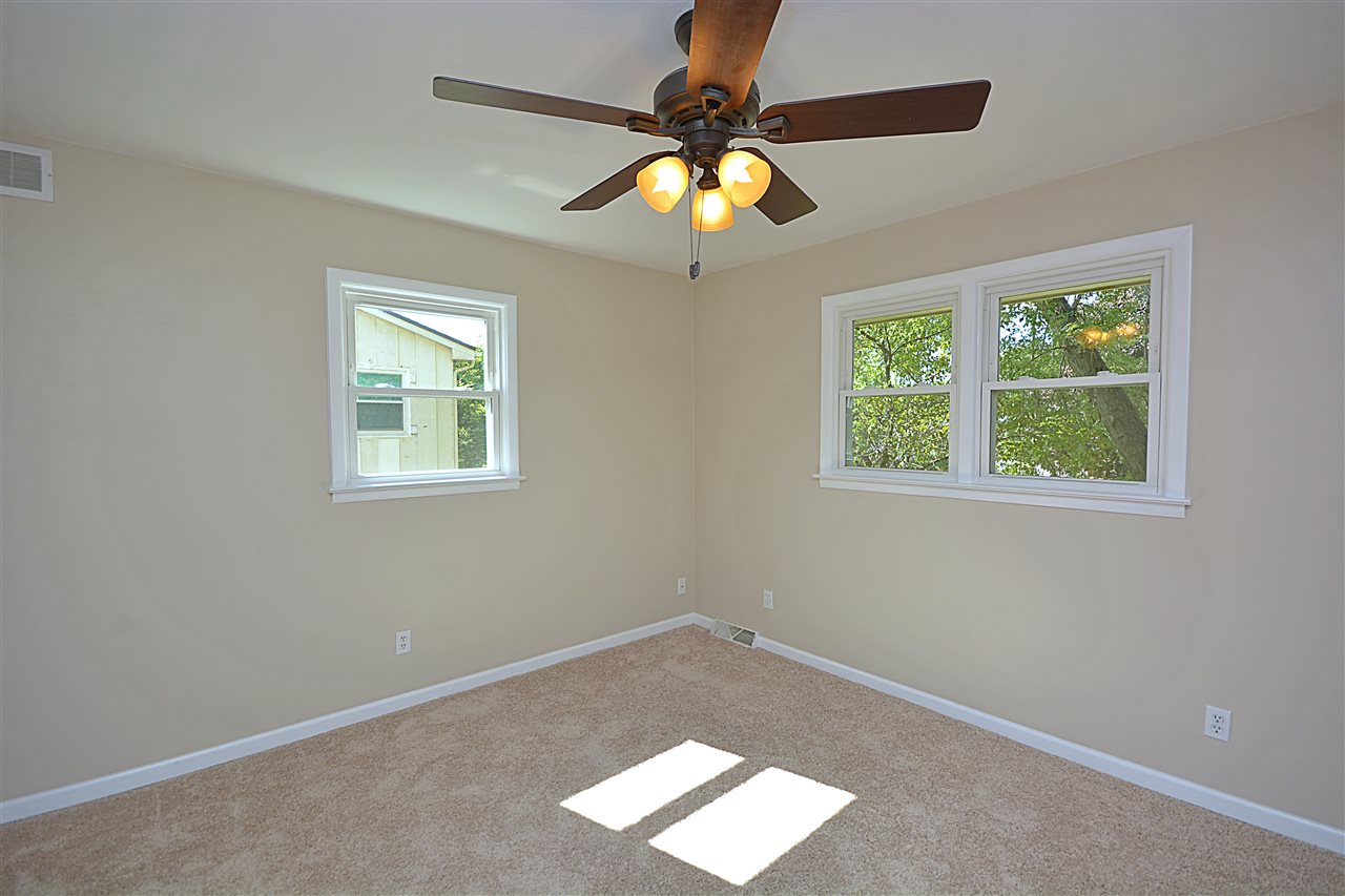5181 Welsh Road Rockford, IL 61107 - Photo 13 of 24 a view of an empty room with a window