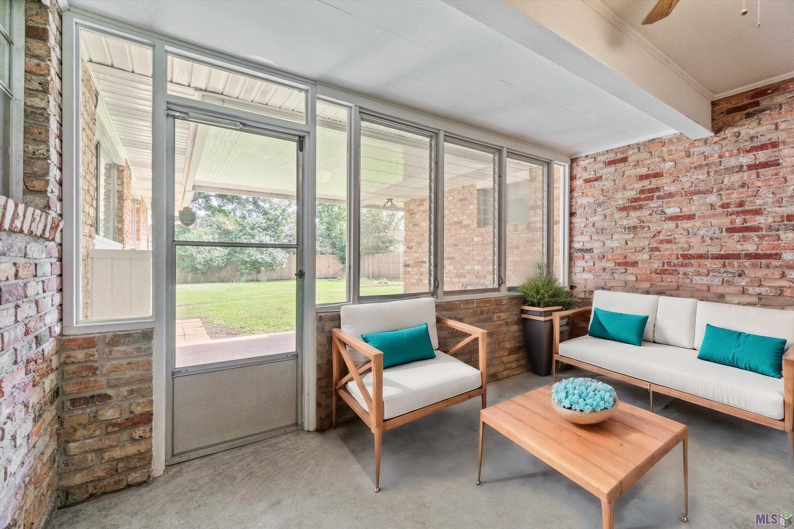 10490 Firelight Avenue Baton Rouge, LA 70815 - Photo 21 of 25 Virtually Staged Sunroom