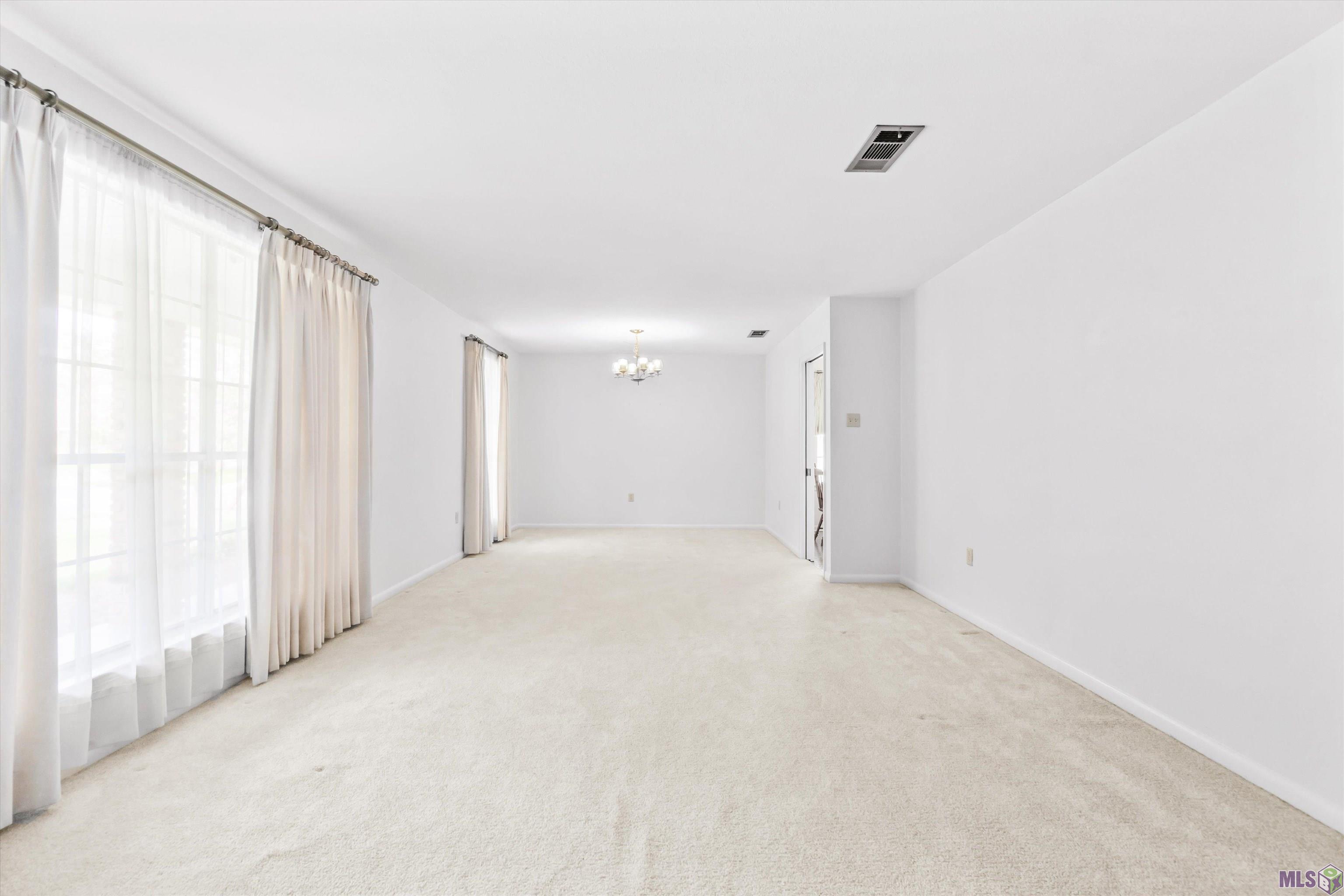 10490 Firelight Avenue Baton Rouge, LA 70815 - Photo 5 of 25 Living RoomDining Room