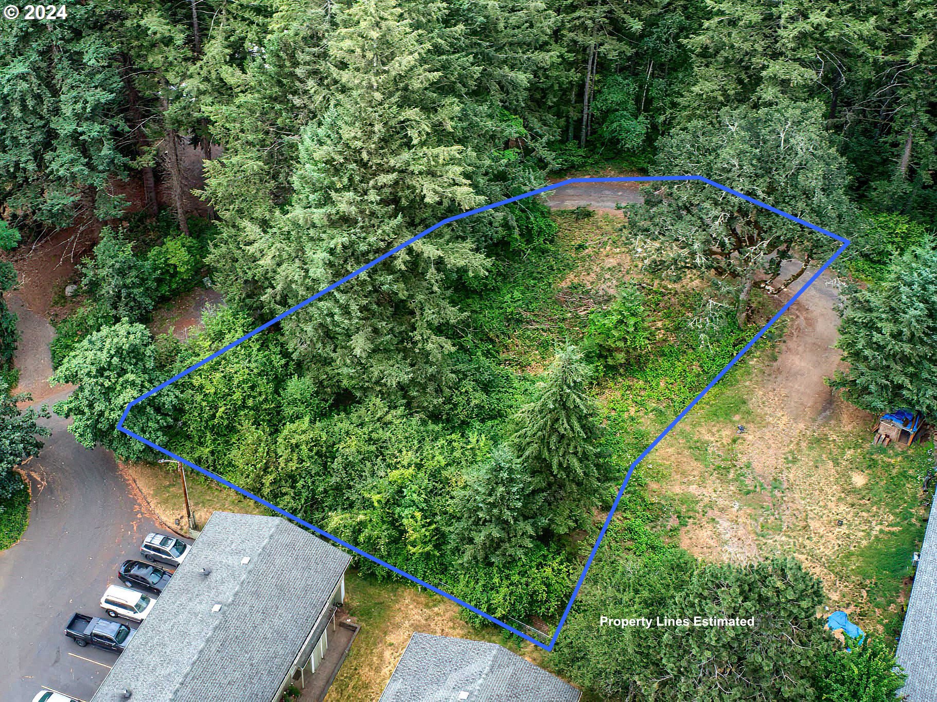 80 Northwest Lasher Road Stevenson, WA 98648 - Photo 13 of 15 an aerial view of a house with a yard and lake view