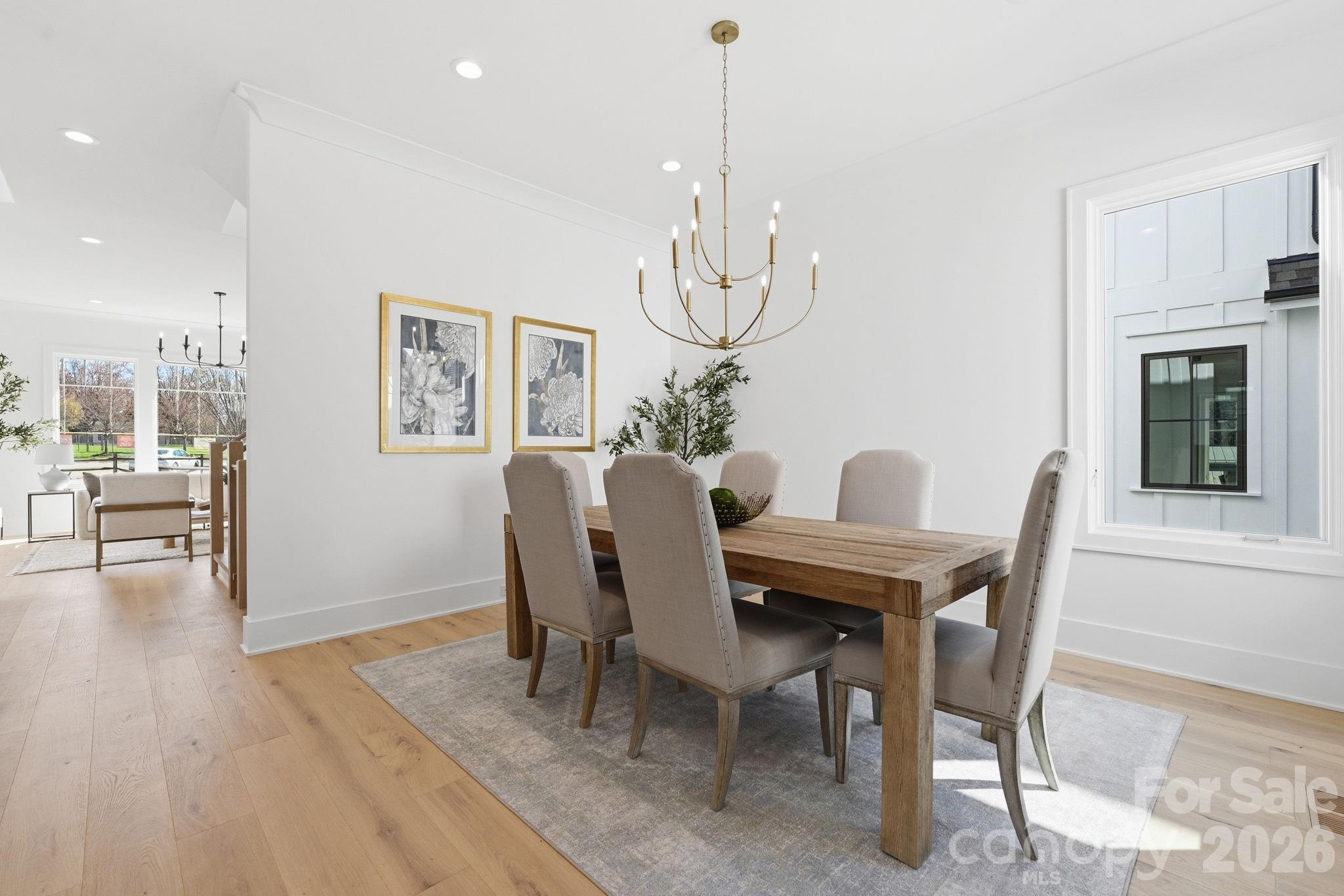 610 Walnut Street Davidson, NC 28036 - Photo 12 of 33 a view of a dining room with furniture window and wooden floor