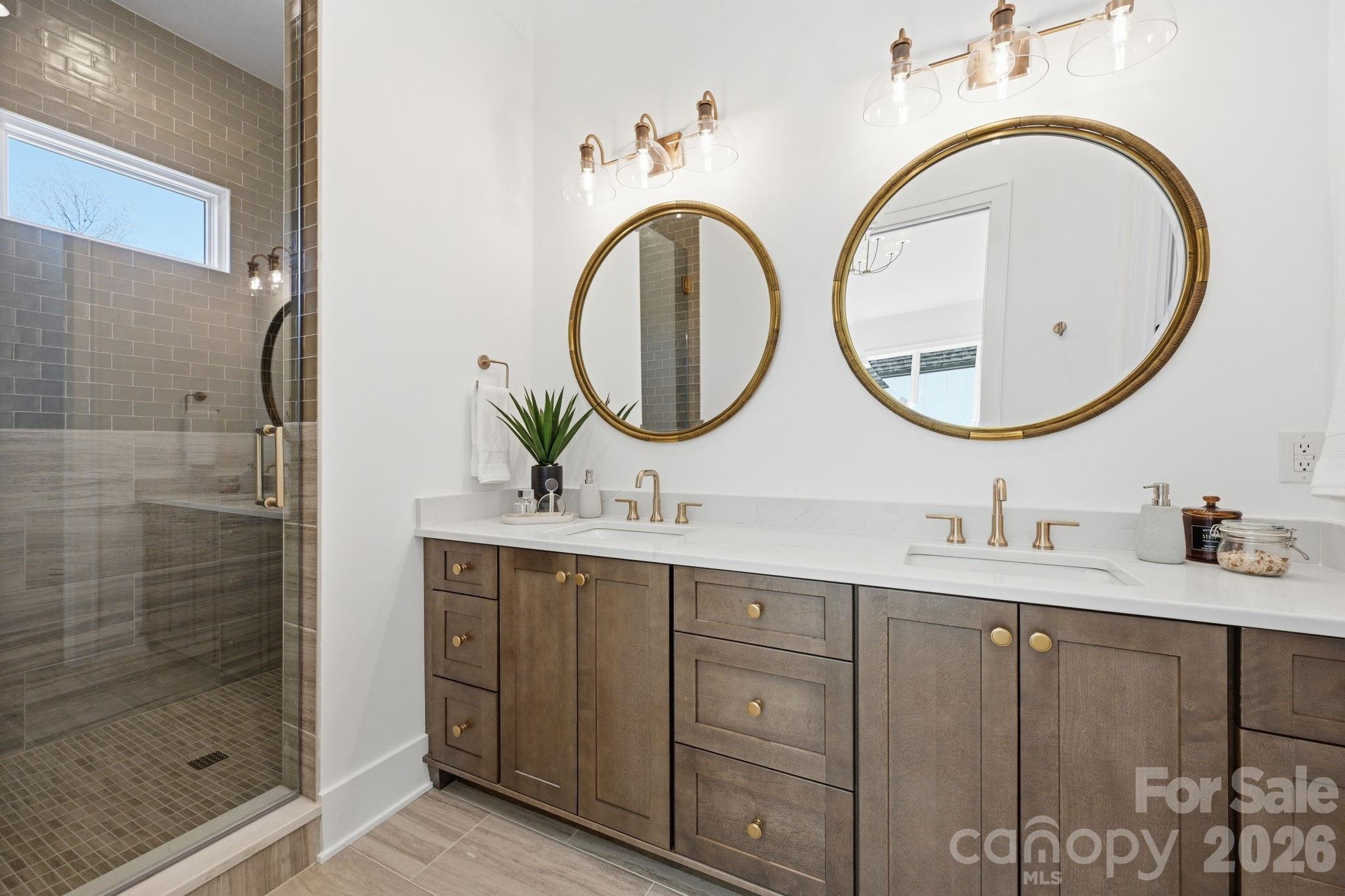 610 Walnut Street Davidson, NC 28036 - Photo 19 of 33 a bathroom with a sink and a mirror