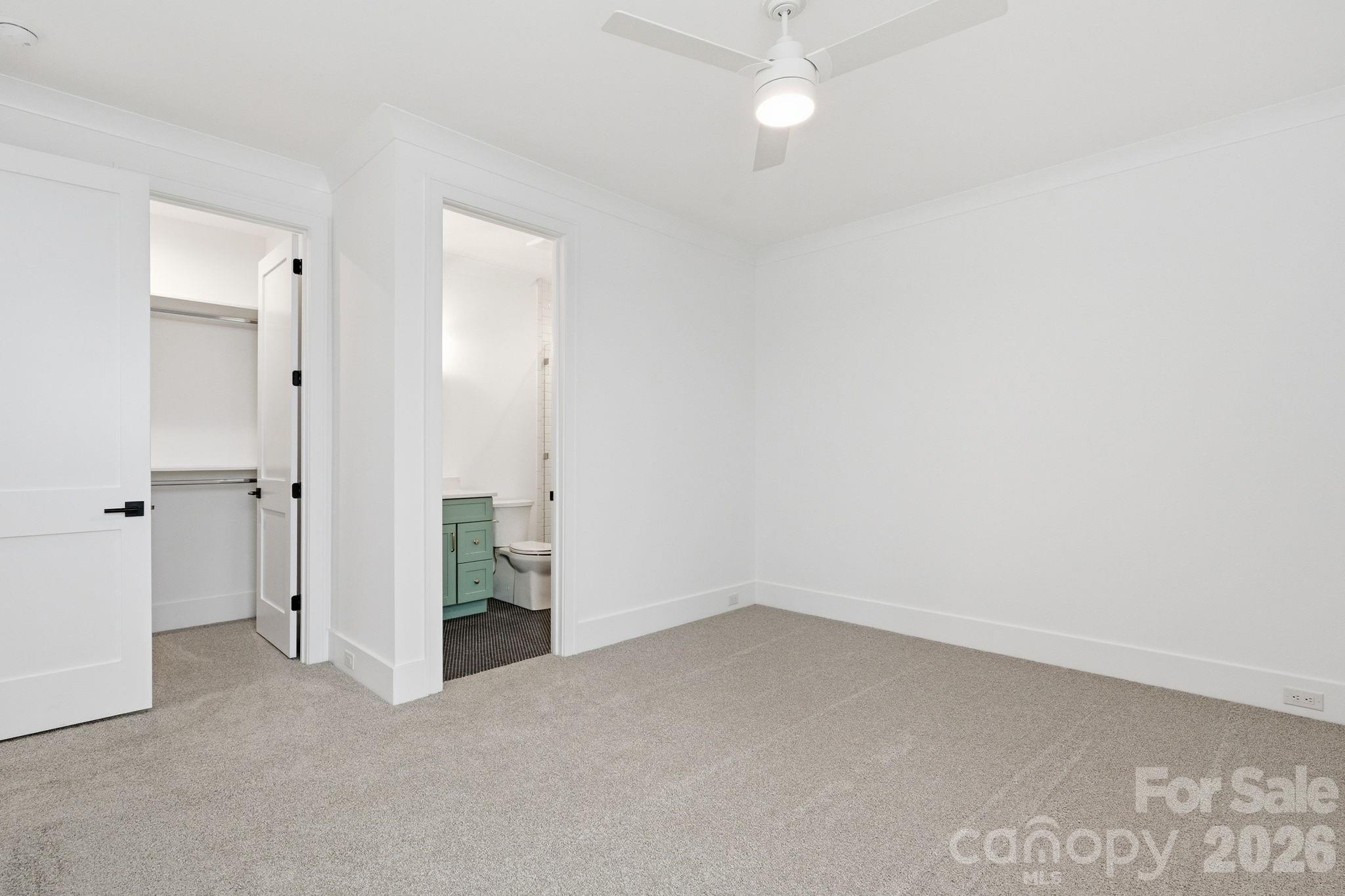 610 Walnut Street Davidson, NC 28036 - Photo 20 of 33 an empty room with an entryway and closet