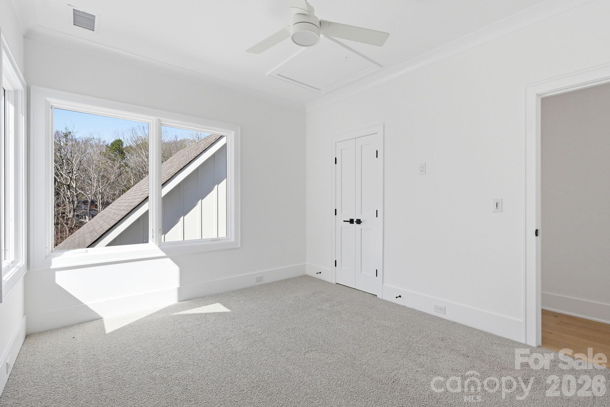 610 Walnut Street Davidson, NC 28036 - Photo 27 of 33 a view of an empty room with a window