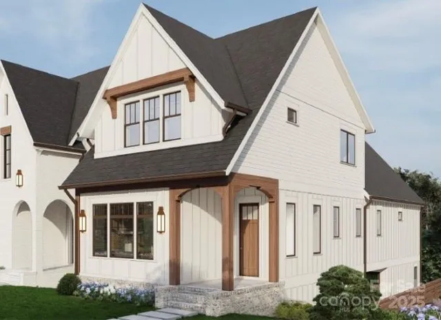 a view of a house with more windows and plants