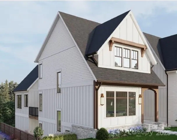 a view of house with yard