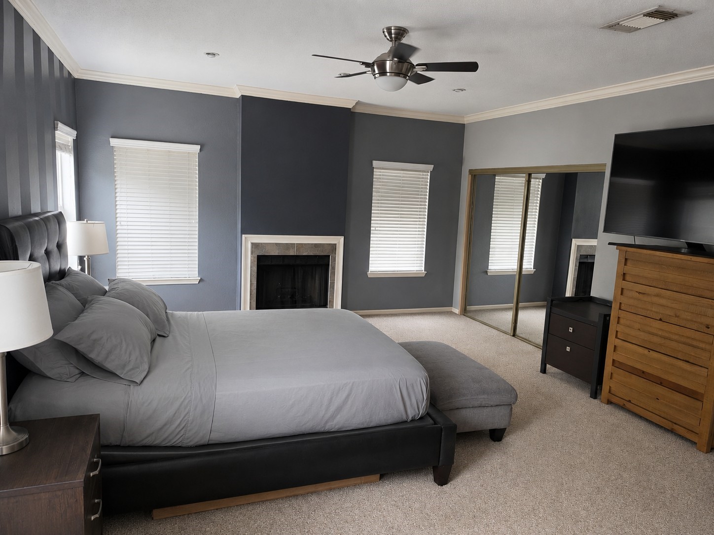 6000 Reims Road, Unit 3601 Houston, TX 77036 - Photo 8 of 13 a bedroom with a bed and a flat screen tv