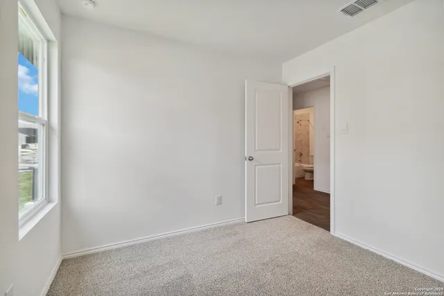 an empty room with a window