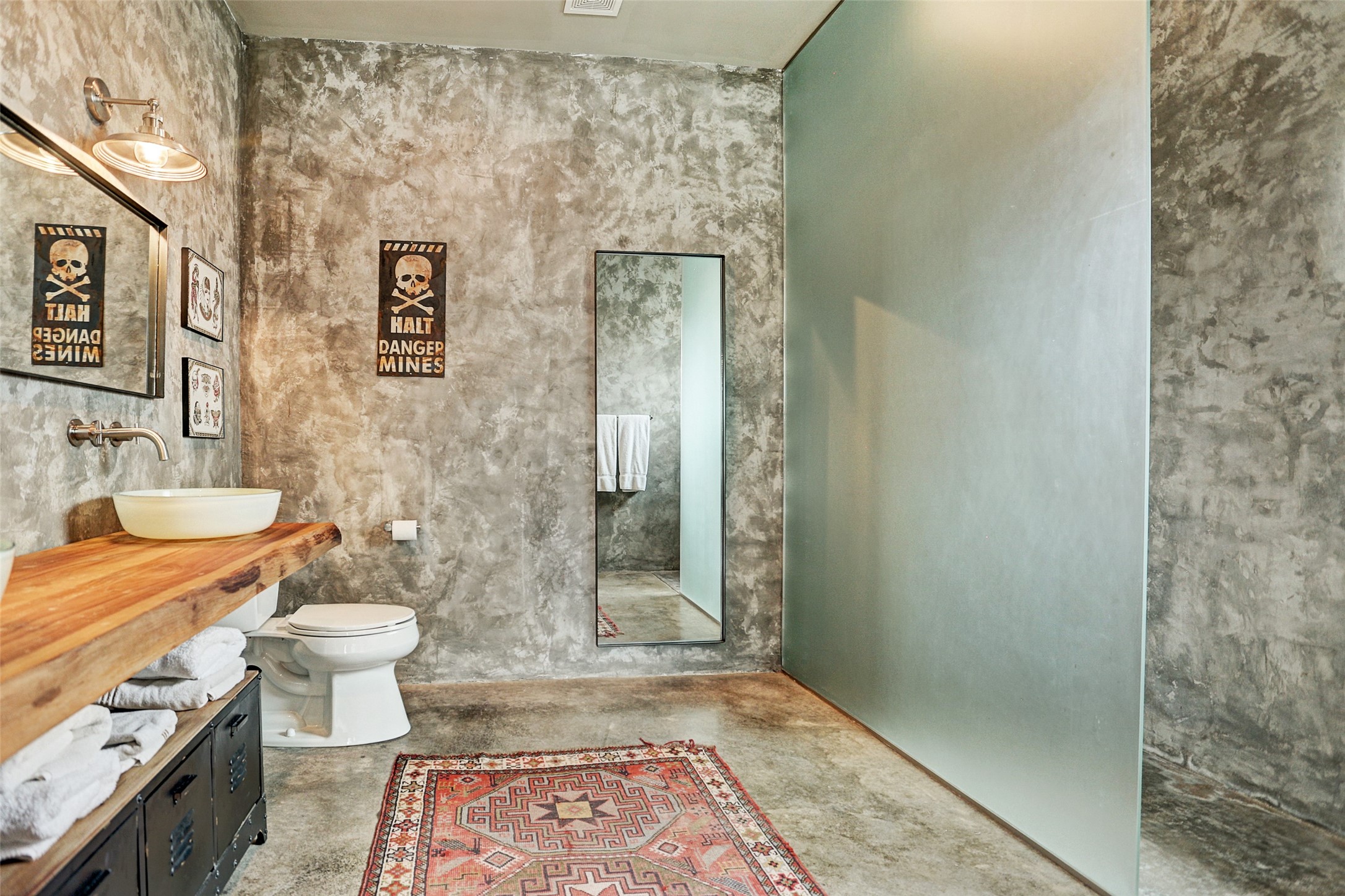 808 Coronado Street Houston, TX 77009 - Photo 36 of 50 Unit 2, primary en suite bathroom with double vanity, open shelving, and stone walls.