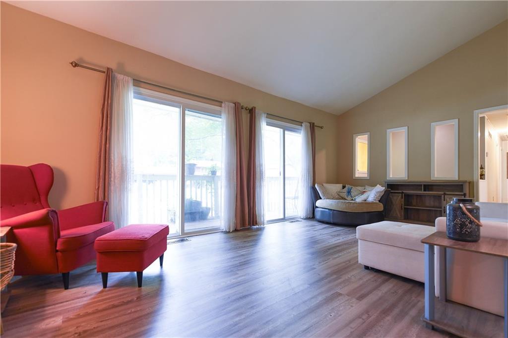 3280 Devilla Trace College Park, GA 30349 - Photo 11 of 21 a living room with furniture and a wooden floor