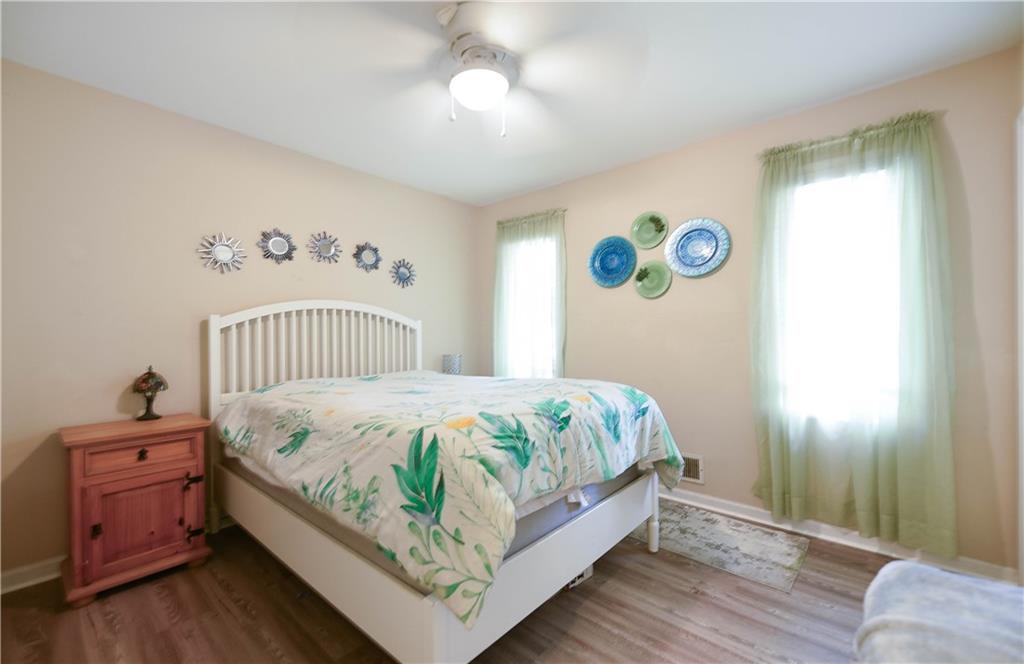 3280 Devilla Trace College Park, GA 30349 - Photo 6 of 21 a bedroom with a bed and a window
