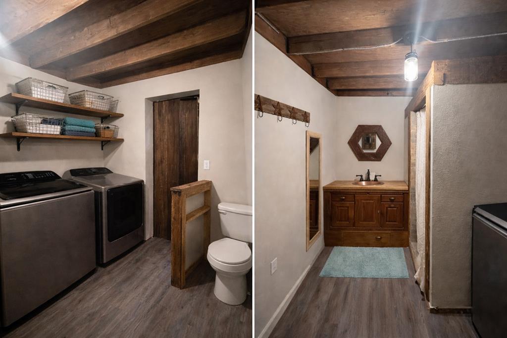 6187 Mockingbird Lane Murchison, TX 75778 - Photo 6 of 11 a bathroom with a toilet a sink and mirror