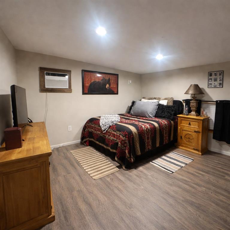 6187 Mockingbird Lane Murchison, TX 75778 - Photo 9 of 11 a bedroom with a bed and a desk