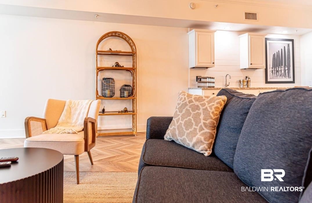 27800 Canal Road, Unit 212 Orange Beach, AL 36561 - Photo 23 of 43 Living room with baseboards and visible vents