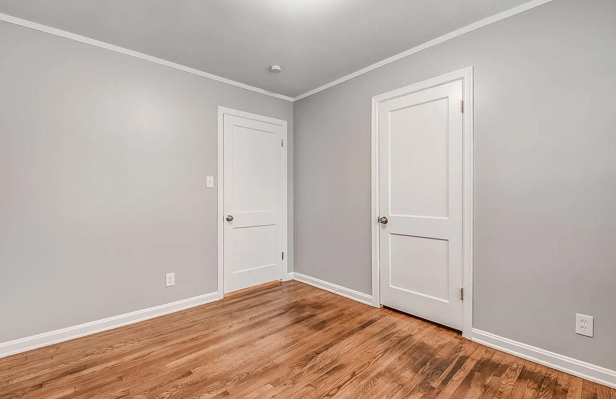 4402 Boyce Road Memphis, TN 38117 - Photo 13 of 13 a view of an empty room with wooden floor