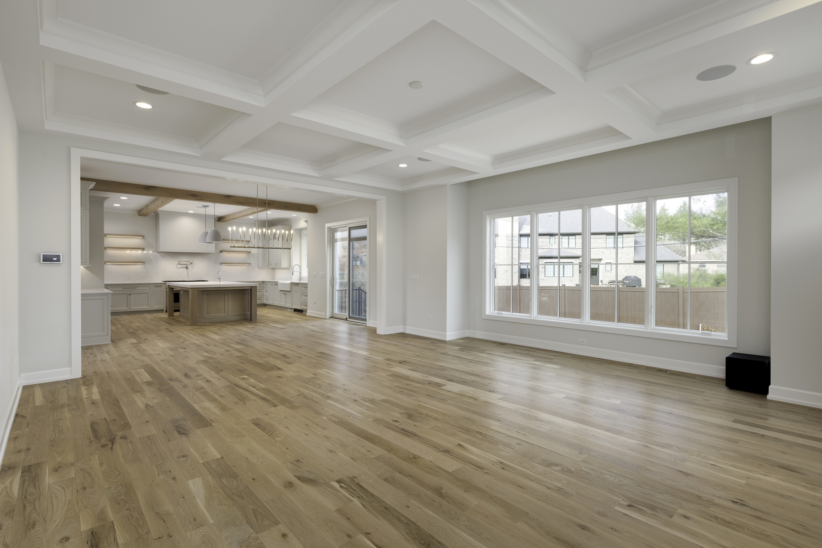845 Tulip Lane Naperville, IL 60540 - Photo 16 of 40 an empty room with wooden floor and windows
