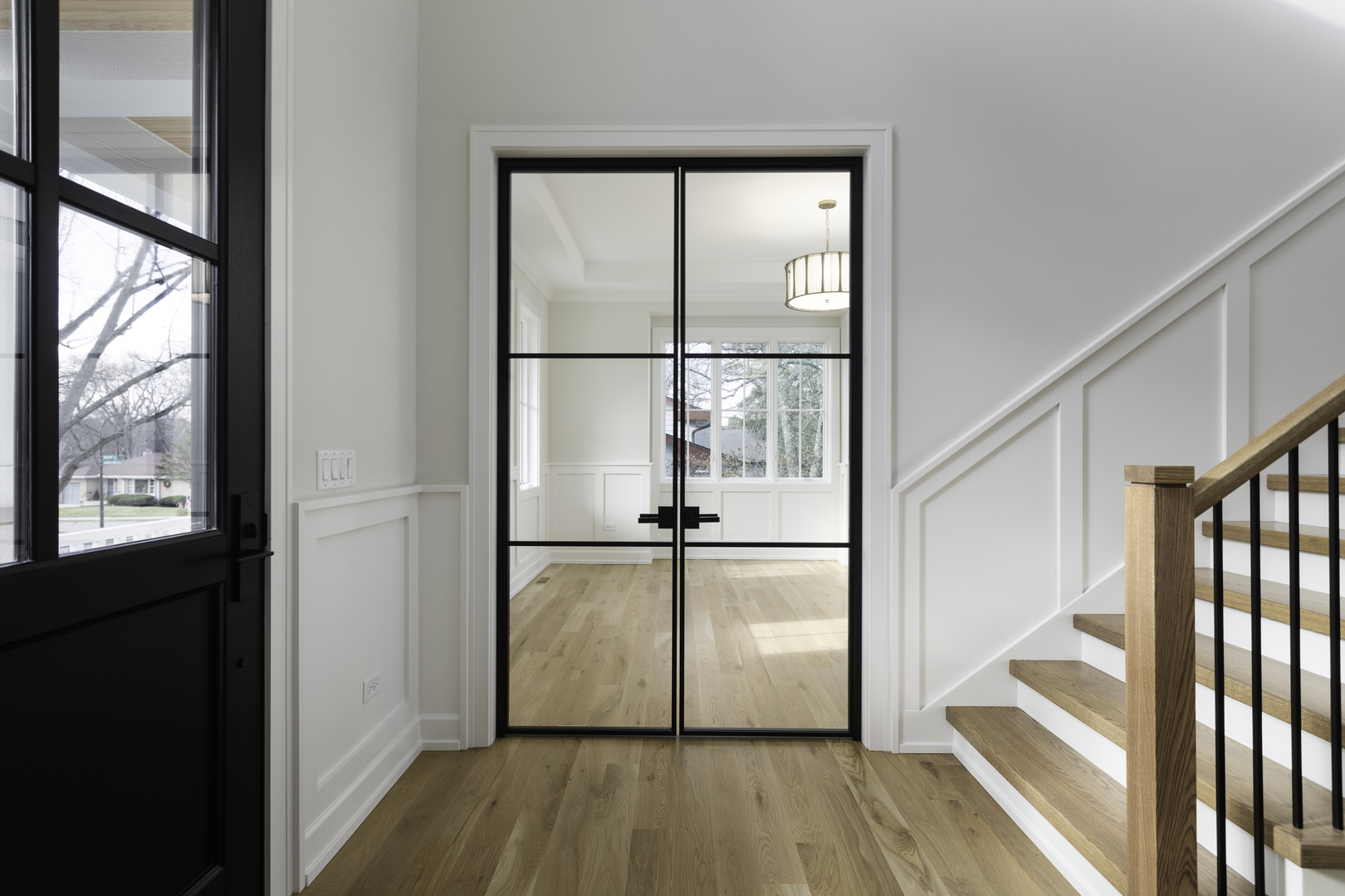 845 Tulip Lane Naperville, IL 60540 - Photo 17 of 40 a view of empty room with wooden floor and fan