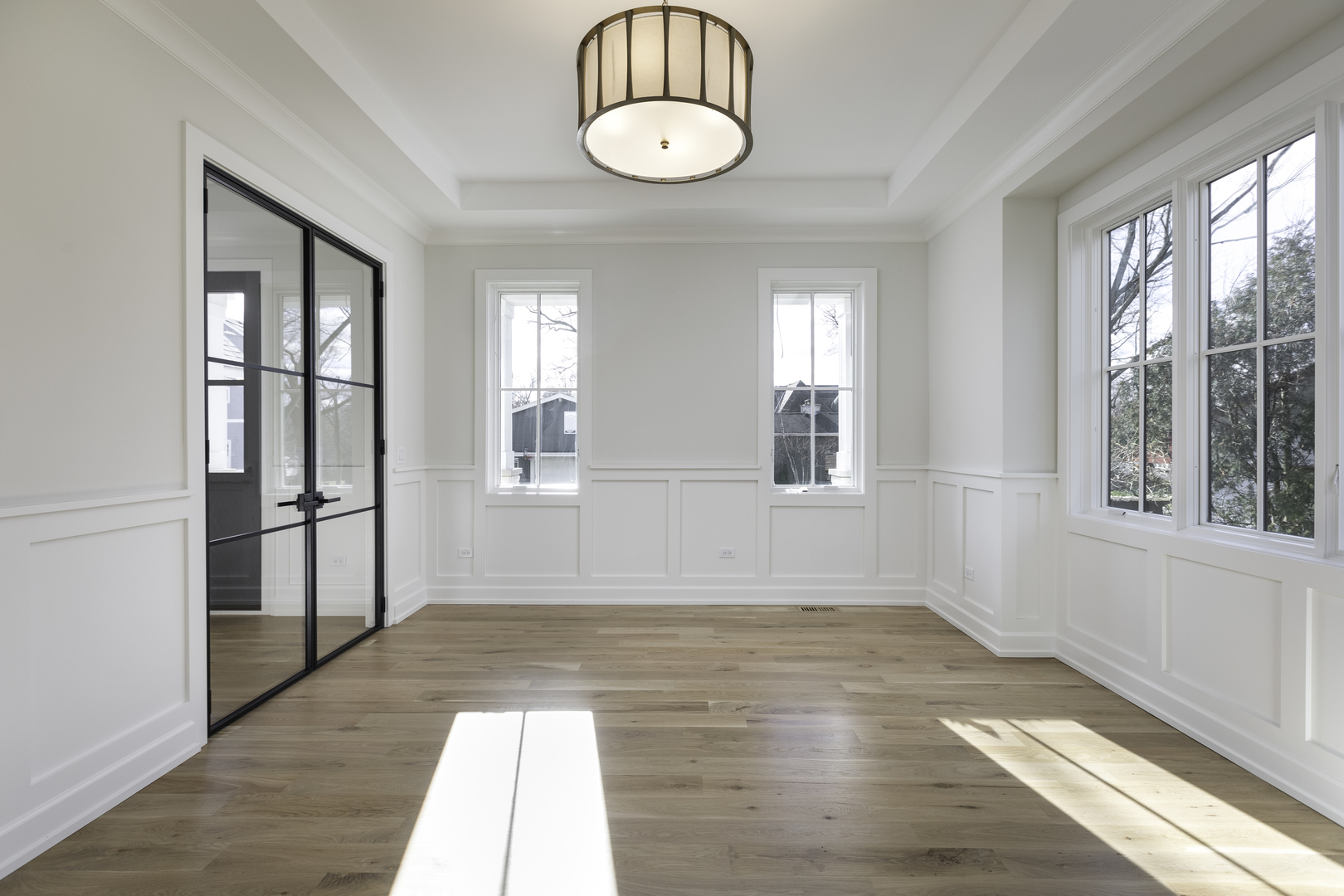 845 Tulip Lane Naperville, IL 60540 - Photo 18 of 40 wooden floor in an empty room with a window