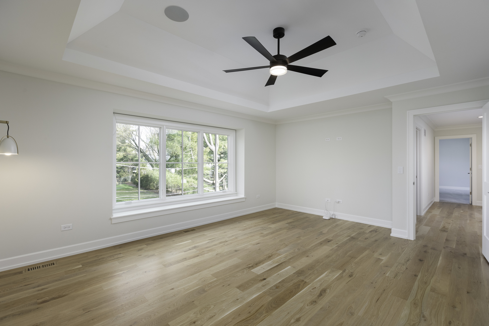 845 Tulip Lane Naperville, IL 60540 - Photo 21 of 40 a view of a big room with wooden floor and windows