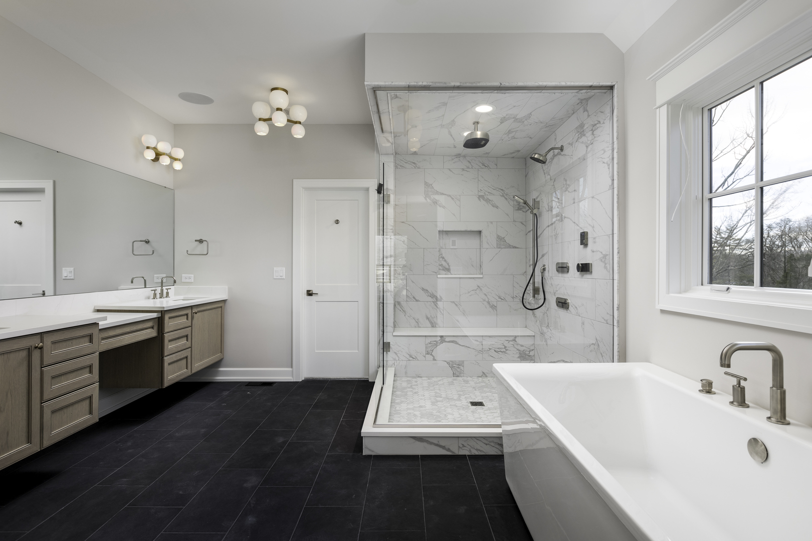 845 Tulip Lane Naperville, IL 60540 - Photo 24 of 40 a large bathroom with a tub sink shower and mirror